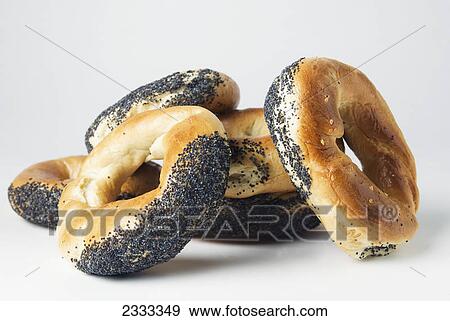 Stock Photo - Poppy seed bagels on a white background. Fotosearch