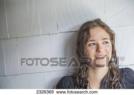Portrait of a girl with long brunette hair; Connecticut united states of america View Large Photo Image Stock Photo - Portrait of a girl with long brunette hair; Connecticut united states of america. Fotosearch
