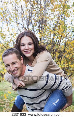 Stock Image - Portrait Of A Husband And Wife; St. Albert Alberta Canada. Fotosearch