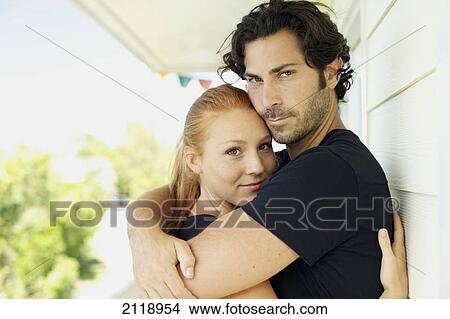 Picture - Portrait Of A Man And Woman In An Embrace; Wailua Kauai Hawaii United States Of America. Fotosearch