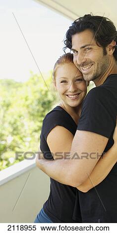 Stock Photography - Portrait Of A Man And Woman In An Embrace; Wailua Kauai Hawaii United States Of America. Fotosearch