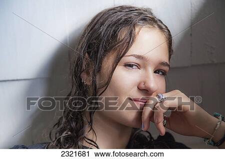 Stock Image - Portrait Of A Teenage Girl With Wet Hair; Connecticut United States Of America. Fotosearch
