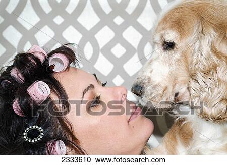 Portrait of a woman wearing hair rollers and her dog; Lacarno ticino switzerland View Large Photo Image Stock Image - Portrait of a woman wearing hair rollers and her dog; Lacarno ticino switzerland. Fotosearch