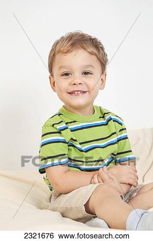 Stock Photograph - Portrait Of A Young Boy; Connecticut United States Of America. Fotosearch
