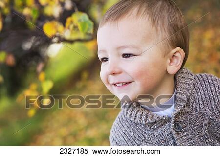 Portrait of a young boy; St. albert alberta canada View Large Photo Image Stock Photography - Portrait of a young boy; St. albert alberta canada. Fotosearch