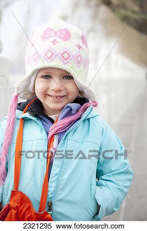 Portrait Of Young Girl Wearing A Winter Hat; Beijing China View Large Photo Image Stock Photography - Portrait Of Young Girl Wearing A Winter Hat; Beijing China. Fotosearch
