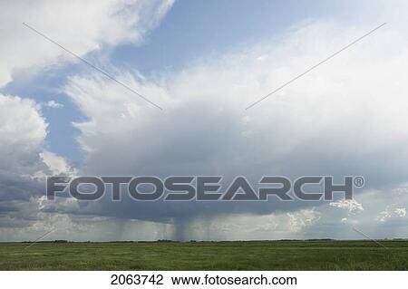 Rain Clouds Over Green Prairie; Canada, Manitoba, Erickson View Large Photo Image Stock Image - Rain Clouds Over Green Prairie; Canada, Manitoba, Erickson. Fotosearch