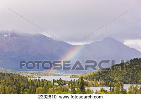 Rainbow over Moose Pass, fall, Kenai Mountains, Chugach National Forest, Kenai Penninsula, Southcentral Alaska, USA. View Large Photo Image Stock Image - Rainbow over Moose Pass, fall, Kenai Mountains, Chugach National Forest, Kenai Penninsula, Southcentral Alaska, USA.. Fotosearch
