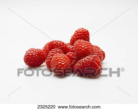 Stock Image - Raspberries on a white background. Fotosearch