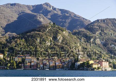 Residential buildings right along the water's edge View Large Photo Image Stock Image - Residential buildings right along the water's edge. Fotosearch
