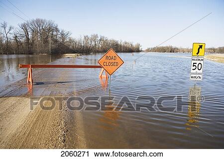 Road Is Closed Due To Red River Flooding In Rural Manitoba View Large Photo Image Stock Image - Road Is Closed Due To Red River Flooding In Rural Manitoba. Fotosearch