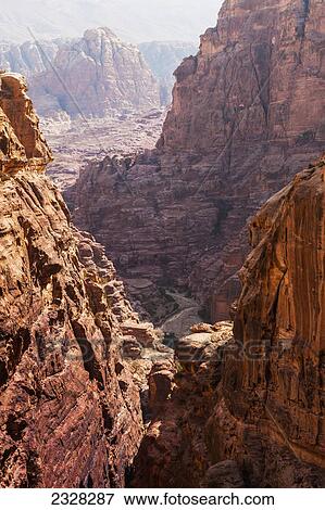 Stock Photo - Rocky hills and mountains in an ancient city; Petra jordan. Fotosearch
