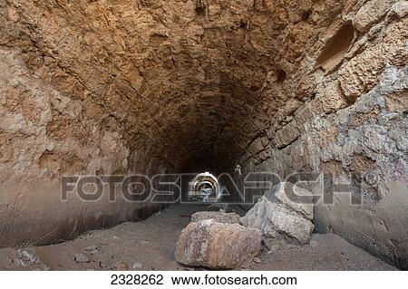 Stock Image - Roman aqueduct in caesarea maritima a national park on the israeli coastline near the town of caesarea; Caesarea israel. Fotosearch