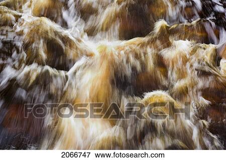 Stock Photo - Rushing River. Cape Breton Highlands National Park, Nova Scotia. Fotosearch