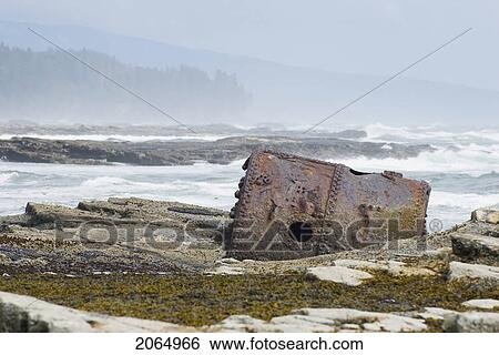 Stock Photograph - Rusty Steamship Boiler That Has Been In This Place Since The Ship Wrecked In 1898, Pacific Rim National Park, B. C.. Fotosearch