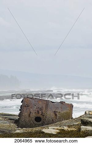 Stock Photography - Rusty Steamship Boiler That Has Been In This Place Since The Ship Wrecked In 1898, Pacific Rim National Park, B. C.. Fotosearch