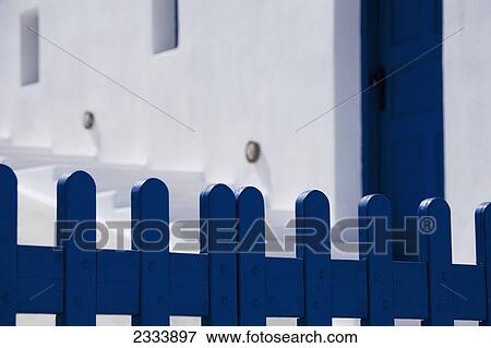 Stock Photo - Santorini blue and white, fence and stairs; Imerovigli, Cyclades, Greece. Fotosearch