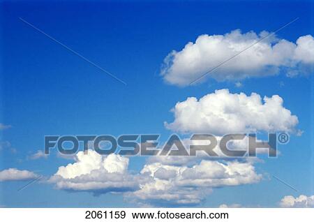 Stock Photo - Scattered White Daytime Clouds. Fotosearch
