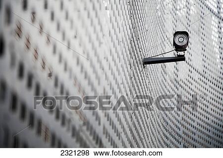 Security Camera On Curving Metal Wall; Beijing China View Large Photo Image Stock Photo - Security Camera On Curving Metal Wall; Beijing China. Fotosearch