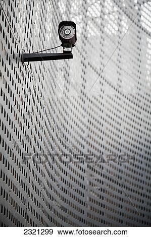 Stock Photo - Security Camera On Curving Metal Wall; Beijing China. Fotosearch