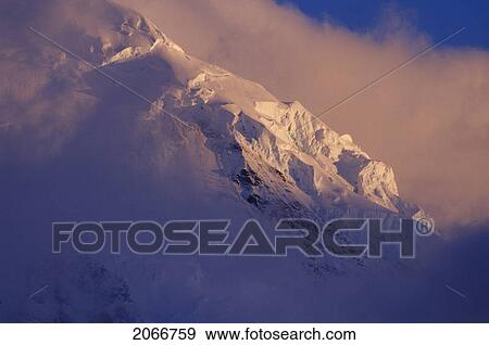 Stock Photo - Seracs On A Ridge Next To The Grand Pacific Glacier In Stormy Changing Weather, Alaska. Fotosearch