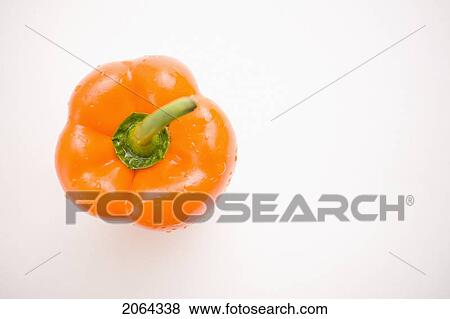 Stock Photo - Single Orange Pepper, From Above. Fotosearch
