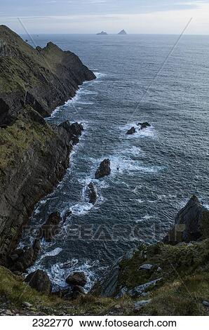 Stock Image - Skellig michael and little skellig viewed from the cliffs above cahersiveen on the ring of skelligs; Iveragh peninsula county kerry ireland. Fotosearch