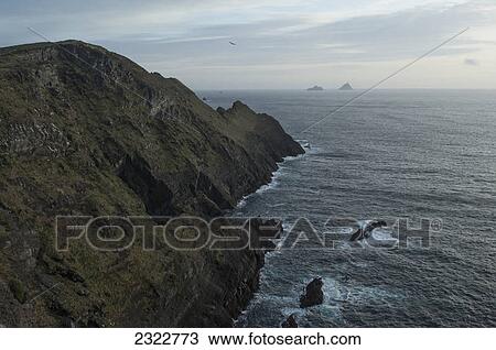 Stock Image - Skellig michael and little skellig viewed from the cliffs above cahersiveen on the ring of skelligs; Iveragh peninsula county kerry ireland. Fotosearch