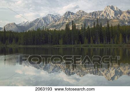 Stock Image - Spillway Lake, The Opal Range, Peter Lougheed Prov. Park, Kananaskis Country, Alberta, Canada. Fotosearch