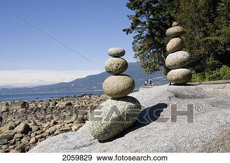 Stock Photo - Stacked Rocks On Beach At English Bay, Vancouver, Bc. Fotosearch