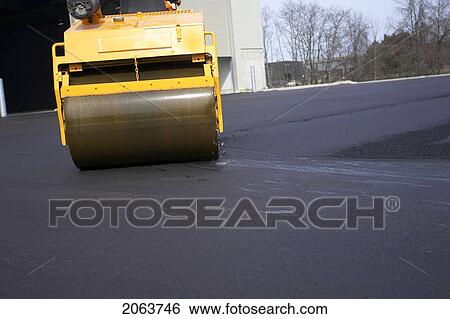 Steam Rollers Paving New Asphalt; Canada, Ontario, Hamilton (Composting Facility) View Large Photo Image Stock Photograph - Steam Rollers Paving New Asphalt; Canada, Ontario, Hamilton (Composting Facility). Fotosearch
