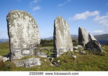 Stock Photo - Stone alignment near waterville at the ring of kerry; County kerry ireland. Fotosearch
