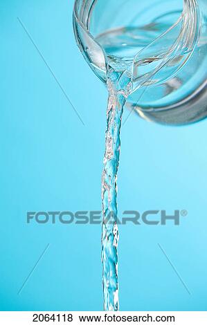 Stream Of Water Being Poured From A Pitcher View Large Photo Image Stock Photo - Stream Of Water Being Poured From A Pitcher. Fotosearch