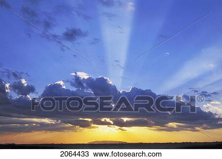 Sun Shafts At Sunset. Serengeti National Park, Tanzania View Large Photo Image Stock Image - Sun Shafts At Sunset. Serengeti National Park, Tanzania. Fotosearch