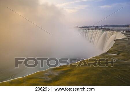 Stock Image - Sunrise And Horseshoe Falls - Niagara Falls Ontario Canada. Fotosearch