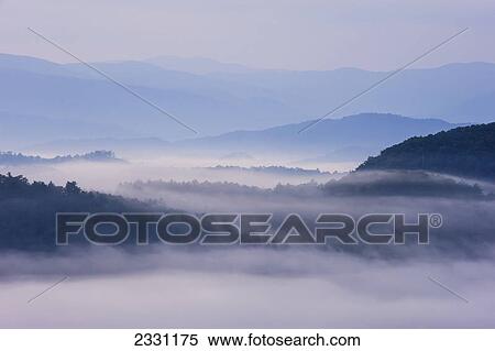 Sunrise as seen from the overlook along the foothills parkway great smoky mountains national park; Tennessee united states of america View Large Photo Image Stock Photography - Sunrise as seen from the overlook along the foothills parkway great smoky mountains national park; Tennessee united states of america. Fotosearch
