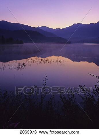 Sunrise Glows Purple In The Reflection, Green Lake, Whistler, Bc View Large Photo Image Stock Image - Sunrise Glows Purple In The Reflection, Green Lake, Whistler, Bc. Fotosearch
