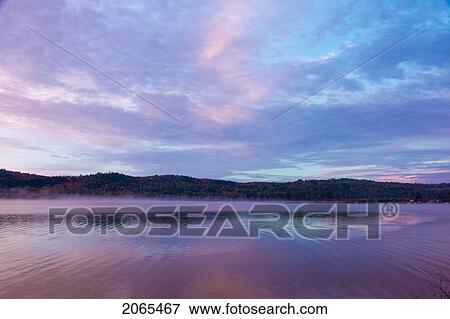 Stock Photo - Sunrise On Two Rivers Lake. Algonquin Provincial Park, Ontario. Canada.. Fotosearch
