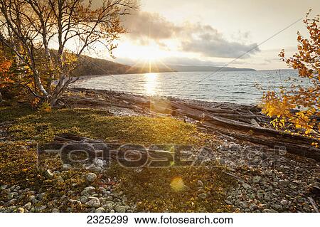 Sunrise over the northern shores of lake superior; Thunder bay ontario canada View Large Photo Image Stock Photo - Sunrise over the northern shores of lake superior; Thunder bay ontario canada. Fotosearch