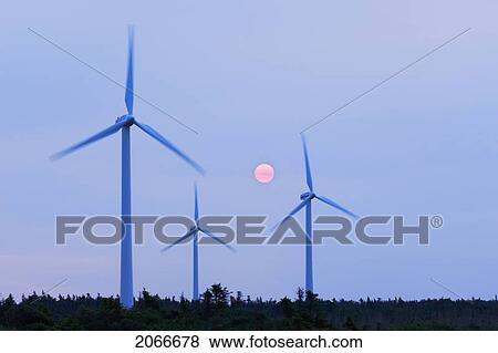 Stock Photo - Sunrise Over Wind Turbines. North Cape, Pei. Fotosearch