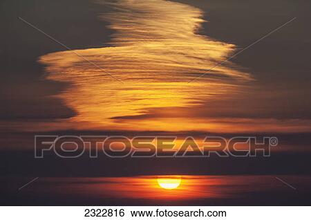 Stock Photograph - Sunset at reenard point looking across to valentia island; Cahersiveen iveragh peninsula county kerry ireland. Fotosearch