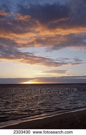 Sunset over the pacific ocean; Honolulu hawaii united states of america View Large Photo Image Stock Image - Sunset over the pacific ocean; Honolulu hawaii united states of america. Fotosearch