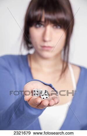Teen Girl Holding A Pair Of Dice; Connecticut United States Of America View Large Photo Image Stock Photo - Teen Girl Holding A Pair Of Dice; Connecticut United States Of America. Fotosearch