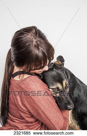 Stock Photography - Teenage Girl With Her Dog; Connecticut United States Of America. Fotosearch