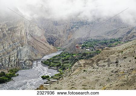 Stock Photograph - Terraces of nepalese tetang village; Upper mustang nepal. Fotosearch