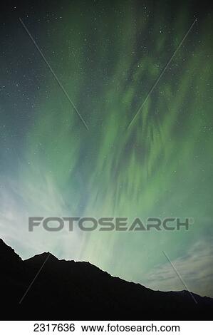 The Aurora Borealis Or Northern Lights Shine In The Night Sky Over The Landscape; Yukon Canada View Large Photo Image Stock Photograph - The Aurora Borealis Or Northern Lights Shine In The Night Sky Over The Landscape; Yukon Canada. Fotosearch