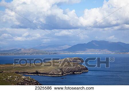 The coast near ballinskelligs with waterville in background; County kerry ireland View Large Photo Image Stock Photograph - The coast near ballinskelligs with waterville in background; County kerry ireland. Fotosearch