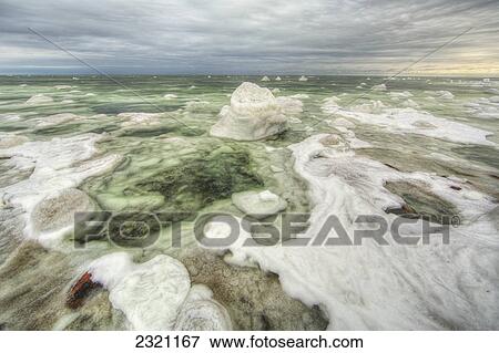 Stock Photo - The Green Ice Filled Water Of Hudson's Bay; Manitoba Canada. Fotosearch
