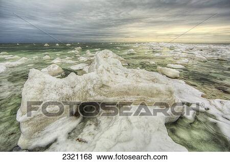 Stock Photo - The Green Ice Filled Water Of Hudson's Bay; Manitoba Canada. Fotosearch