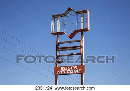 The old frame of a sign against a blue sky; Canada View Large Photo Image Picture - The old frame of a sign against a blue sky; Canada. Fotosearch